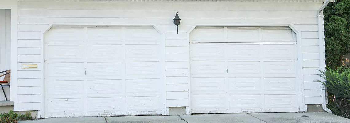 Roller Garage Door Dropped Down Replacement in Lansing, IL