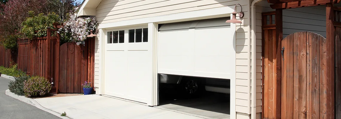 Fix Metal Garage Door Jerking in Lansing, Illinois